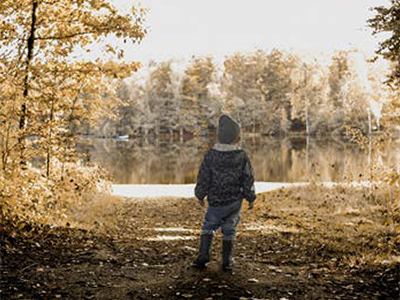 fall someone standing with leaves
